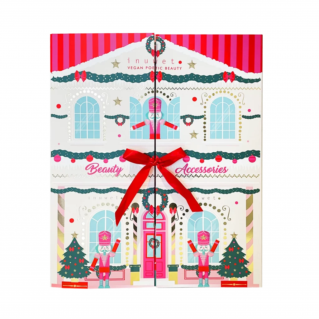 Adventskalender von Inuwet in Form eines Weihanchtshauses mit Nussknackern in Beige und Pink