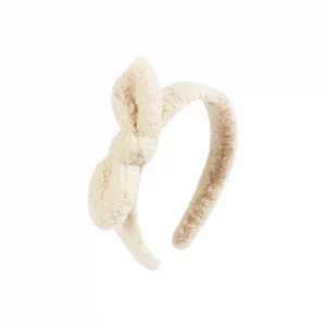 flauschiger Haareif in Cremeweiß aus Teddy-Stoff mit Schleife