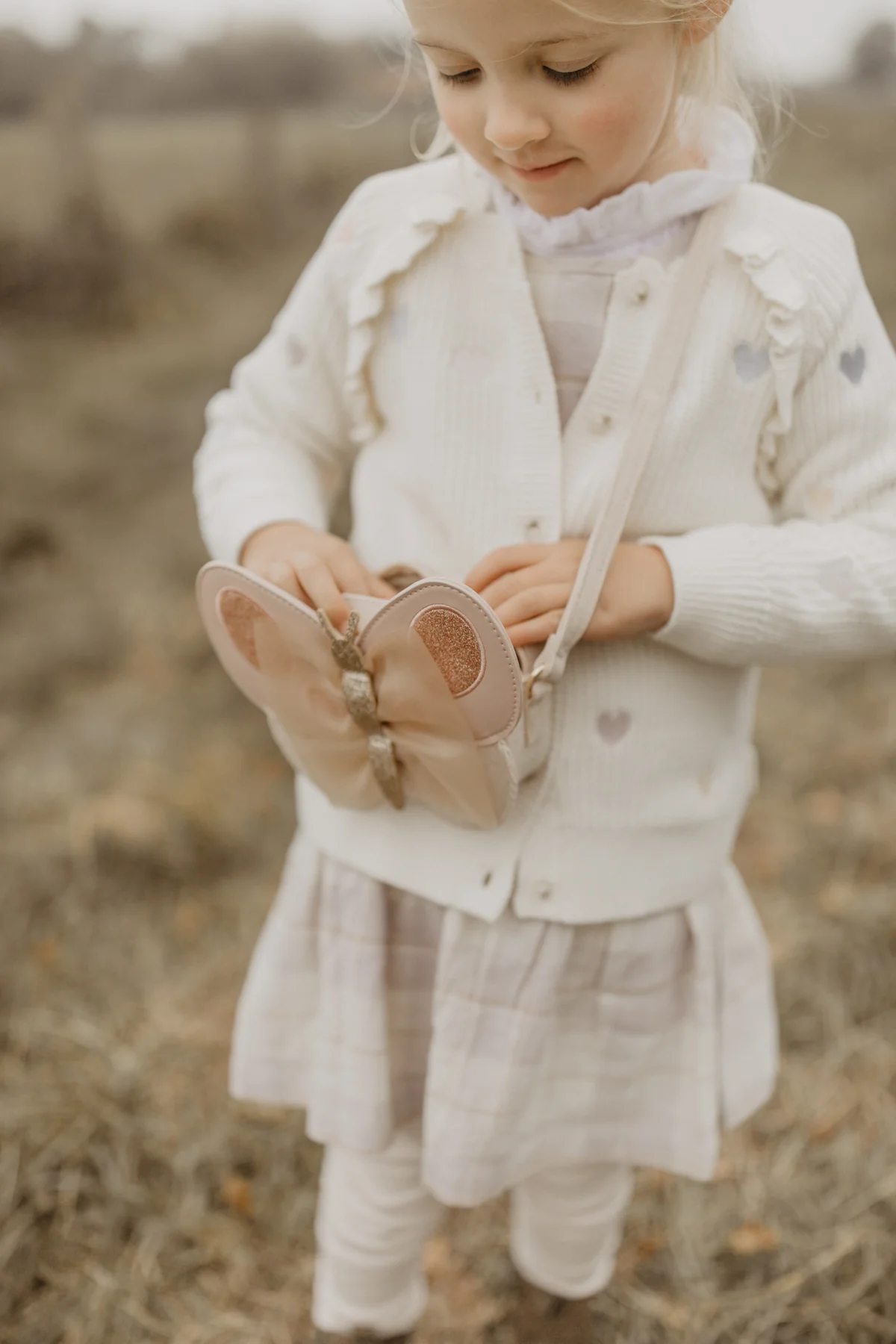 Kinderhandtasche in Schmetterlingsform in den Farben Beige, Gold & Rosa