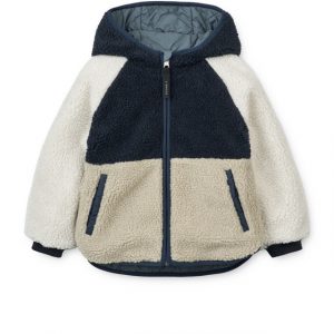 Wendejacke von Liewood in den Farben Blau, Beige, Weiß. Eine Seite in Teddy und eine Seite in Stepp mit Kapuze (Teddy-Seite)