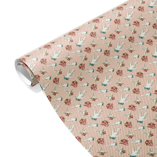 Weihnachtliches Geschenkpapier von Rice mit Tauben und Schleifen auf beigem Grund