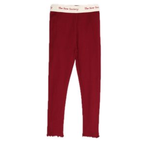 Rib Leggings in Rot mit weißem Gummibund in das "The New Society" in Rot eingewebt ist.