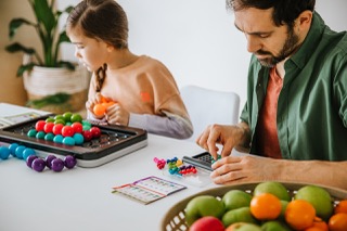 Mann & Mädchen spiel IQ Puzzler Pro XXL